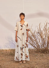 A Model Wearing White Cotton Mul GhironiJumpsuit,curated by Only Ethikal